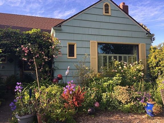 Street view of house. Apartment entrance around back.