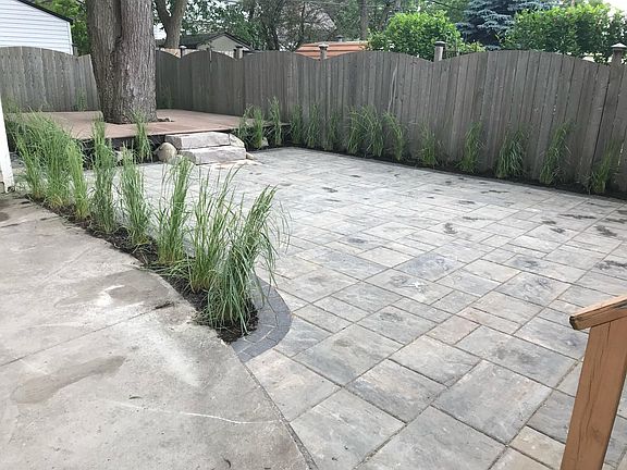 Large patio/deck in fully fenced back yard