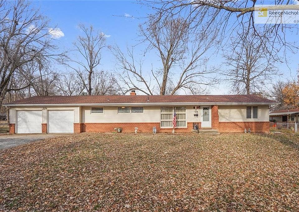 Sprawling Ranch on large corner lot! Sets back nicely from the road.