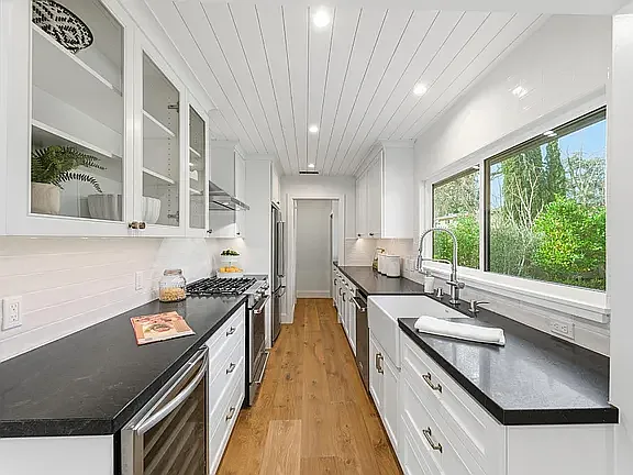 Kitchen with shiplap ceiling, and lots of counter space