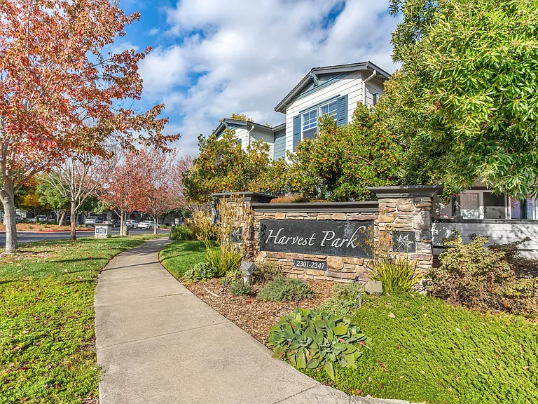 Harvest Park Apartment Homes is graced with luscious trees throughout the property