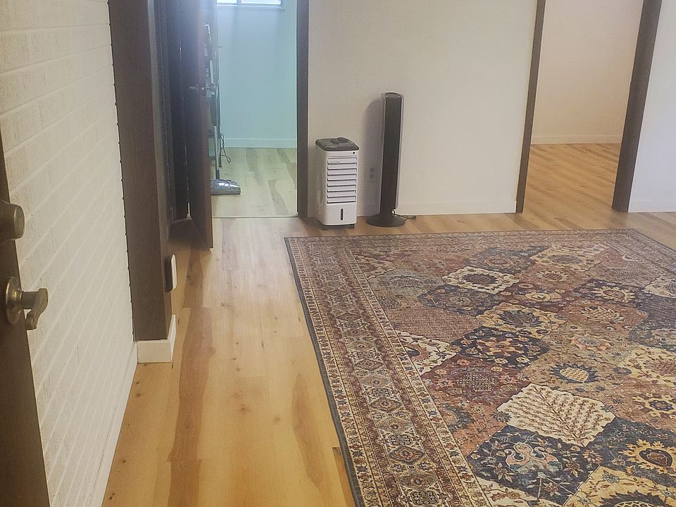 14 x 15' Living room, showing storage room and office room entry.