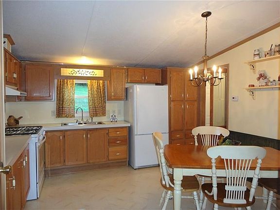 Eat in kitchen measures 13x13 with vaulted ceiling.  Great layout!