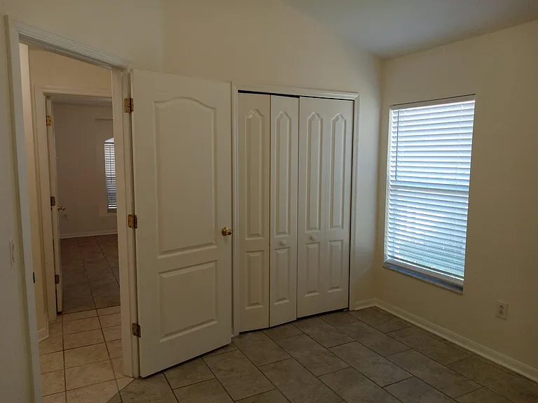 Smallest bedroom view to hallway. Large closet to the right.