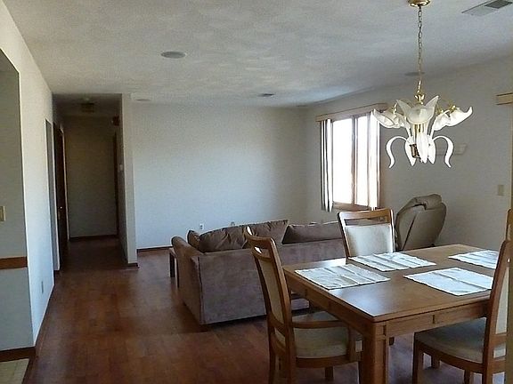 Modern, open living / dining space