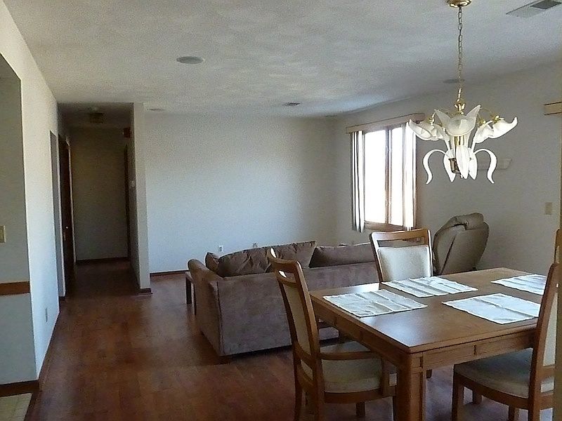 Modern, open living / dining space