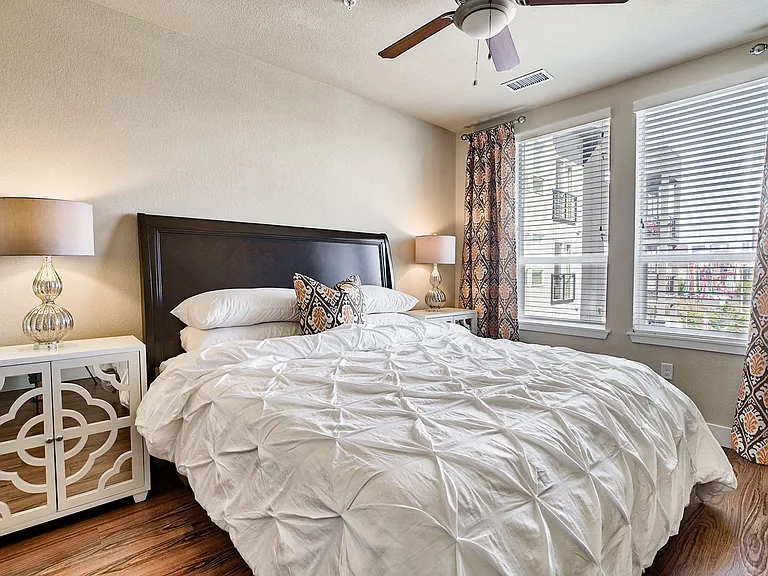 Spacious bedrooms feature ceiling fans