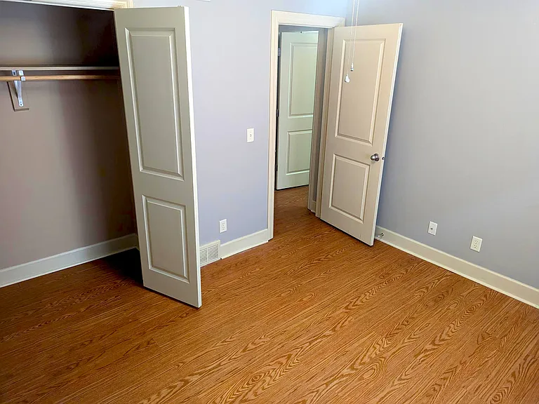 Bedroom closet at Auburn Apartments.