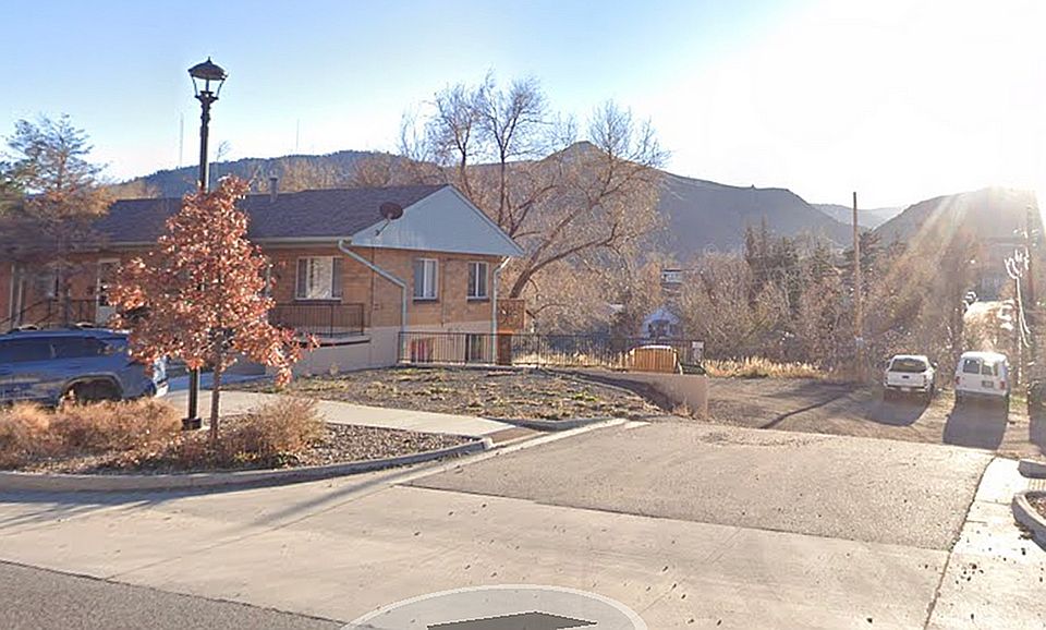 Experience the tranquility of suburban living with stunning mountain views.