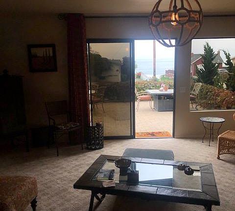 From living room to outside patio with ocean views