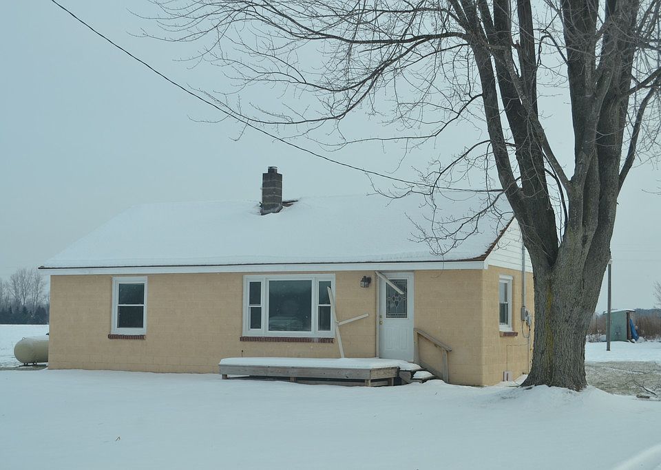 Country living on a 1.52 acre lot.  This home has many updates already completed.  All you have to do is move right in and add your personal touches.  The new roof was just put on July 2016.  The home also has newer laminate flooring through most of the home, a new furnace, and windows.  The front deck was put on just a few years ago.  The back of the home has a covered porch.  Plenty of space in the yard for whatever you would like to do.