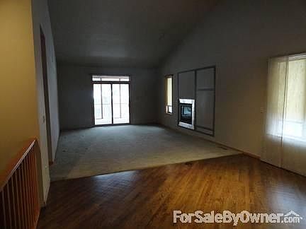 Living Room-Dining Room
						:
						Living Room-Gas Fireplace-Dining Room with Hardwood Floor.