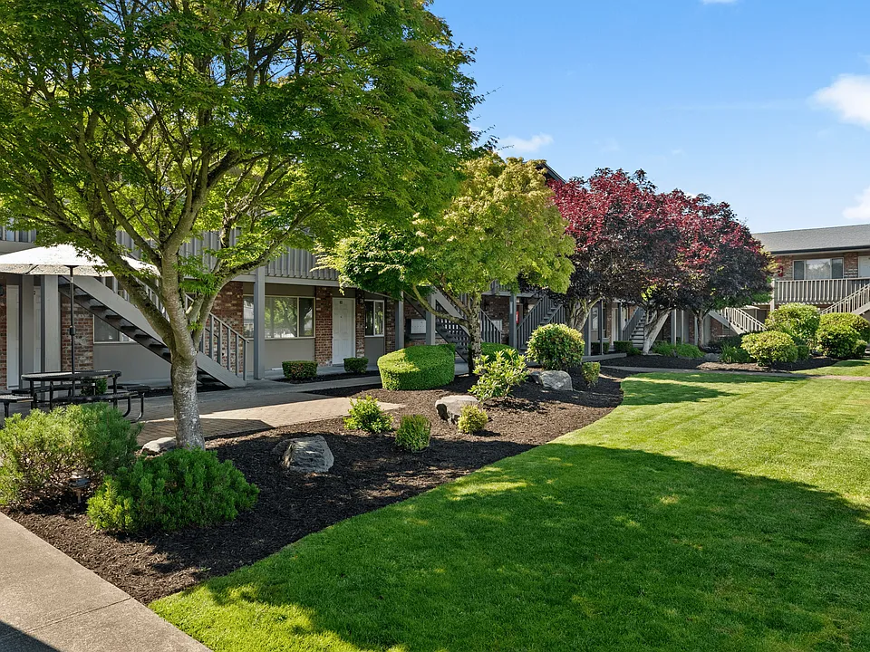 Peaceful courtyard with shaded seating areas.
