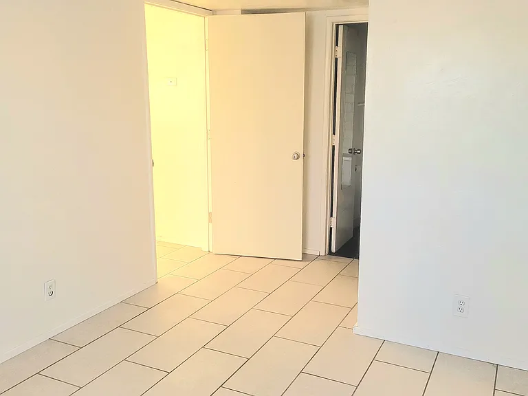 Master bedroom with bathroom and closet