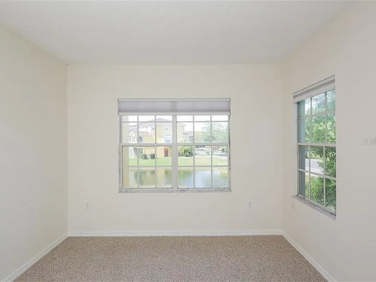 PRIMARY BEDROOM - 11'X12'