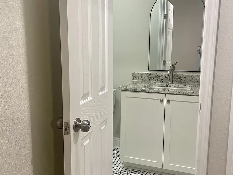 Beautifully renovated hall bathroom, featuring all-new amenities for a modern and refreshing space.
