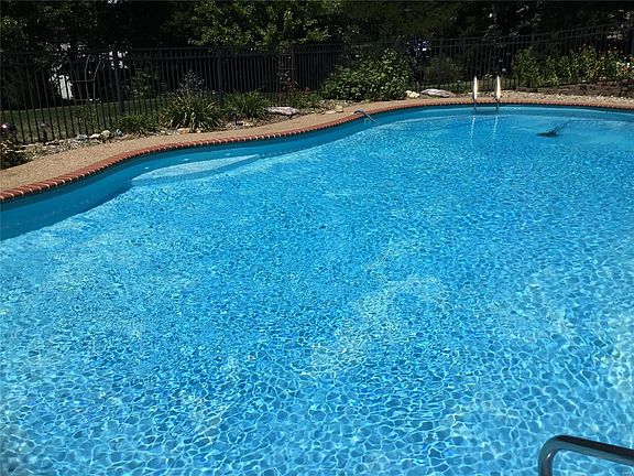 The pool comes with a solar cover and automatic vacuum!