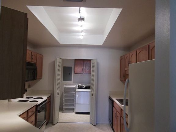 Kitchen And Inside Utility Room With Washer/dryer