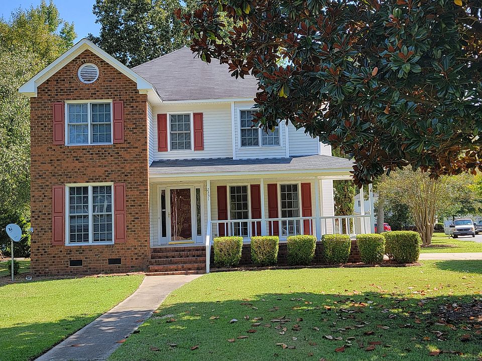 Front view on large corner lot