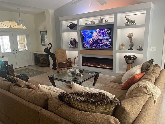 Great room large tv and electric fireplace