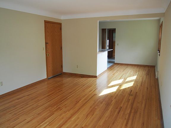 Living room looking to dinette and kitchen