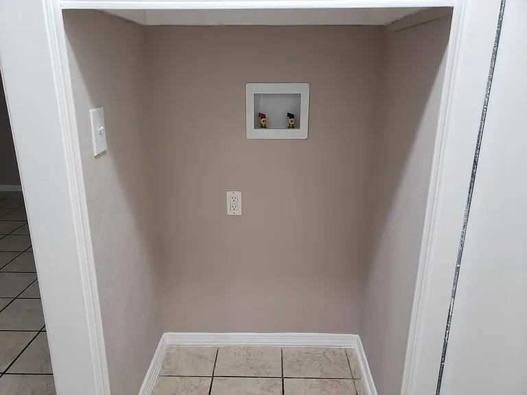 Washer hookup area.