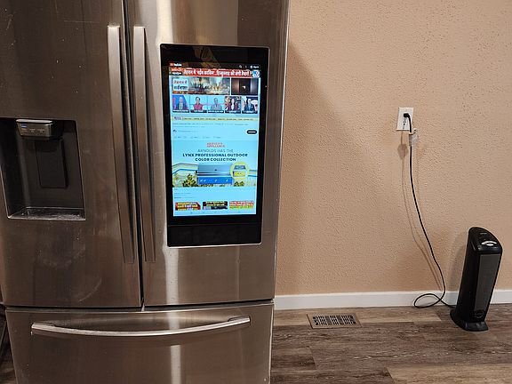Refrigerator with TV SCREEN SPEAKER