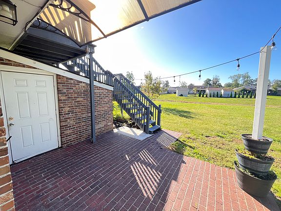 Lower deck area with storage unit. Great for entertaining. Off the dining room and kitchen area.