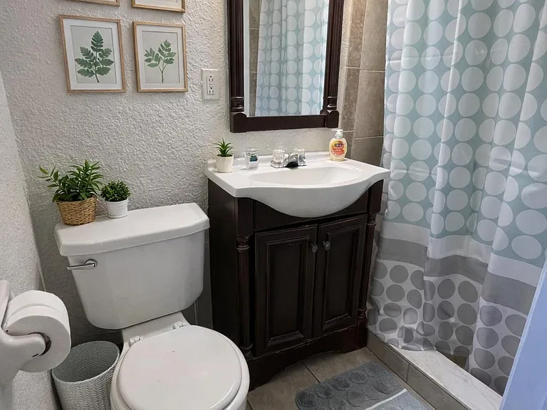Fresh private bathroom with a clean, simple setup that makes daily routines easy