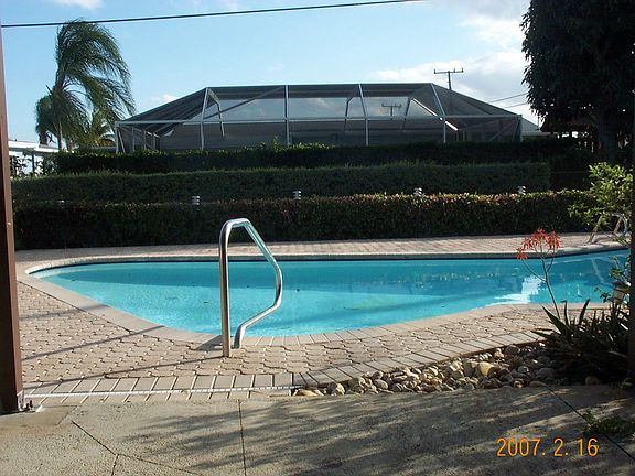 Back under porch looking south