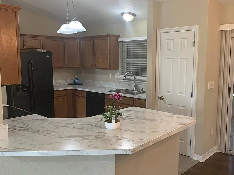 New kitchen counters, sink and faucet.