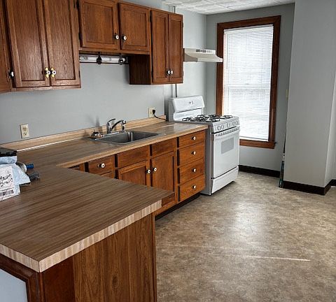 large eat-in kitchen with pantry and lots of natural light. Lots of cabinets and brand new refridgerator