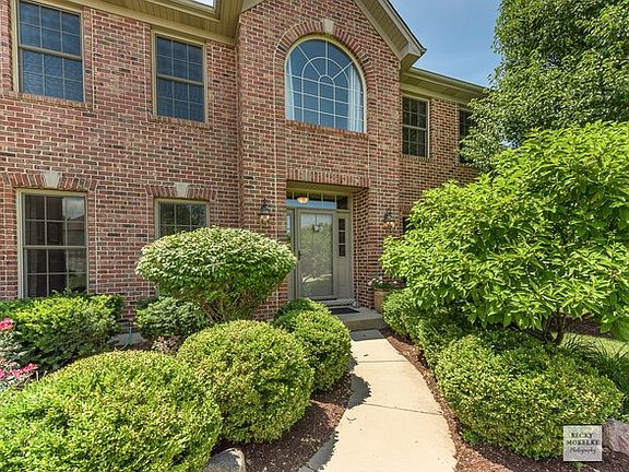 Brick Exterior, mature landscaing.