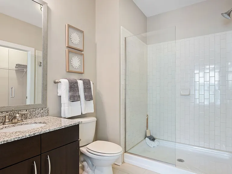 Bathrooms available with glass enclosed showers