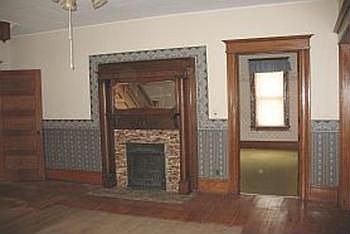 The door from the livingroom leading into the 1st floor bedroom, this is an 11.8 x 14 bedroom with a