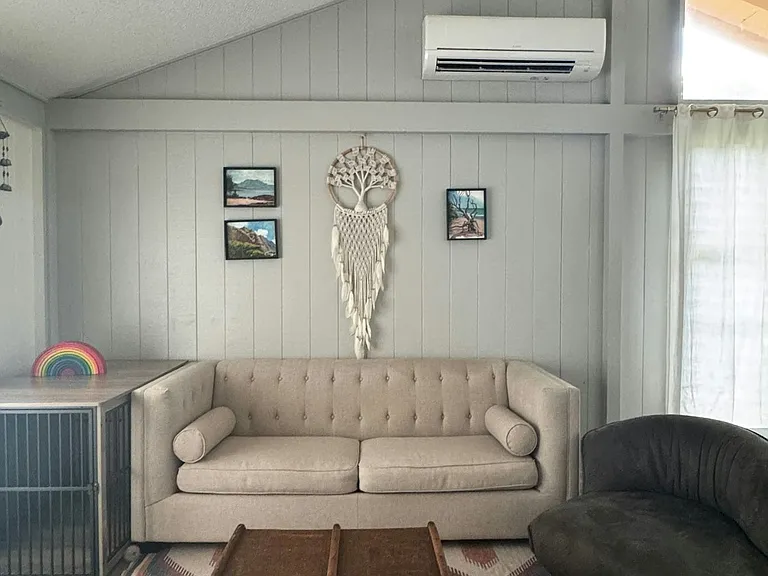 Open living area offers a great conversation area and split AC