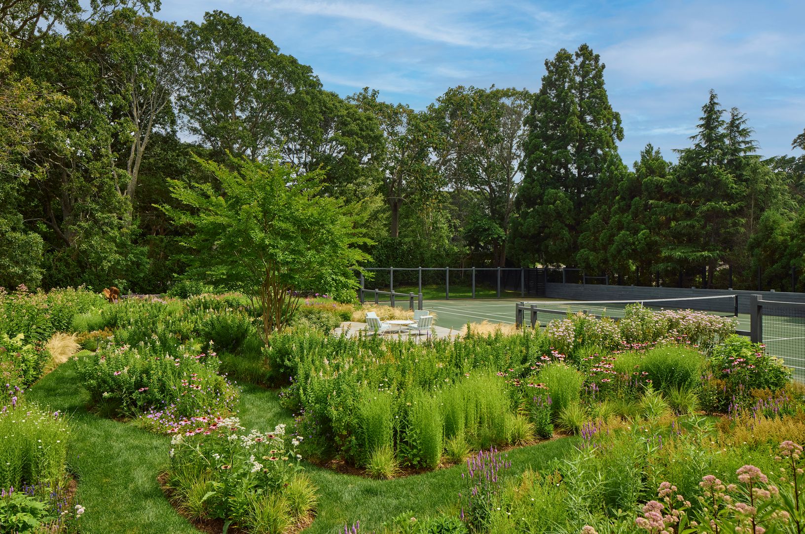  Tennis Court with Pickleball Lines set in Pollinator Gardens