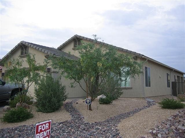 Front of house with mature vegetation for privacy
