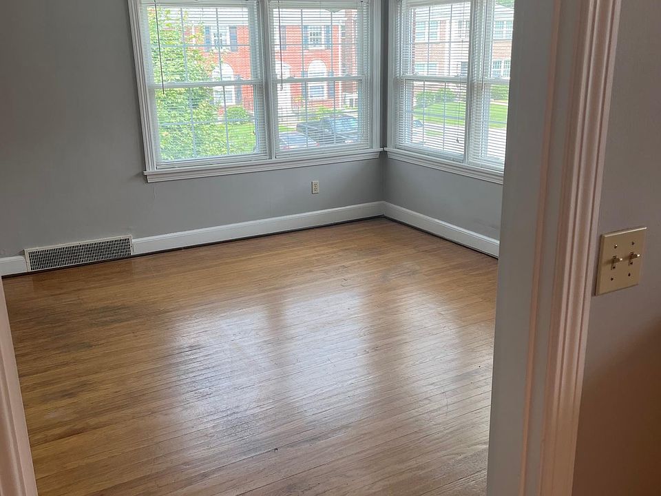 Living room with a nice view out the 4 windows.