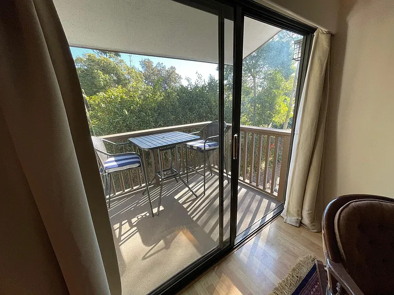 Step out of the master bedroom to the private balcony. View the waves crashing on the beach and the famous East Beach Volley Ball.