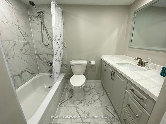 5th image of 7811 Yonge St #1207