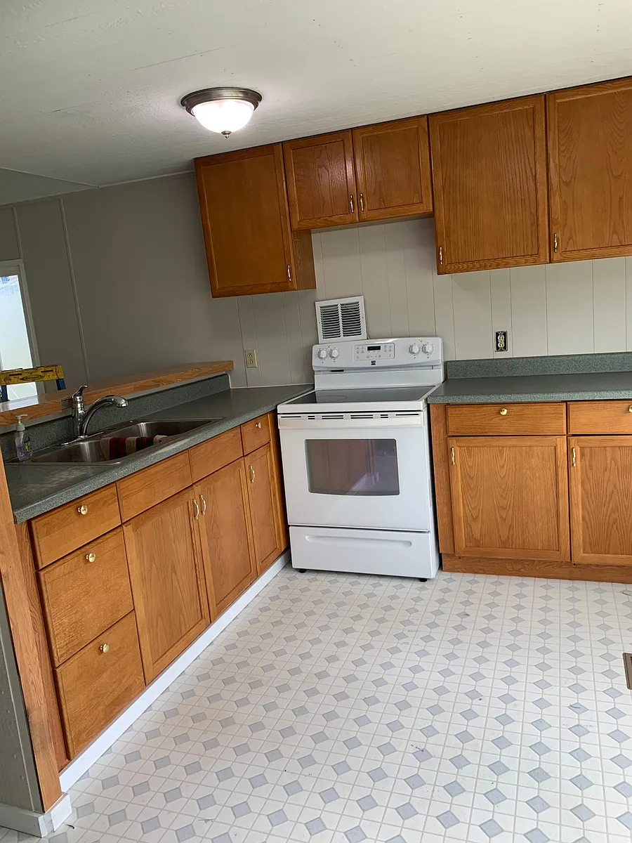 Kitchen-before new flooring - 70 Mansours Pl