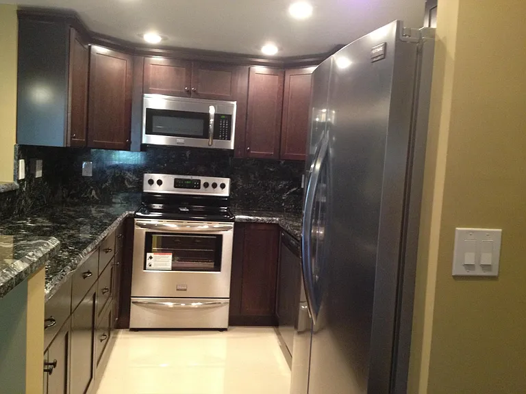 Cherry wood cabinets with beautiful granite