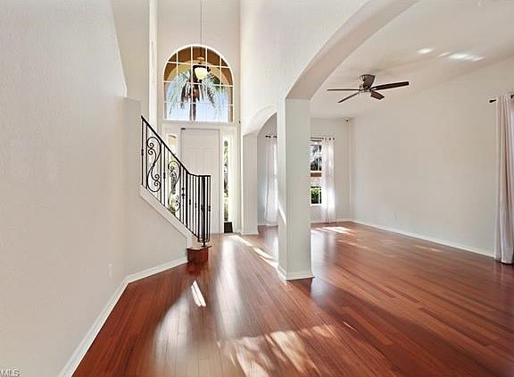 Great room with flow from living room to dining room