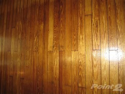 Here are those hardwood floors I was telling you about...This home is sparkly clean and you could ju