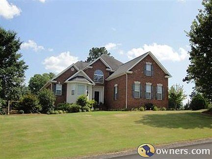 front of home sitting on .49 acre yard