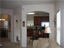 Open Arches Bring Kitchen, Breakfast Area and Living and Dining Rooms Together!
