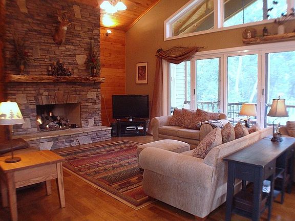 Greatroom with stack stoned fireplace