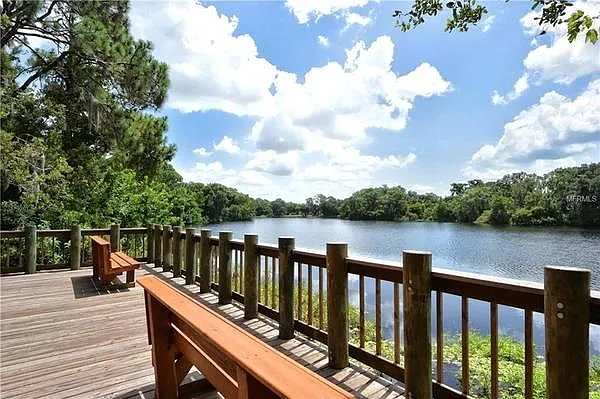 Walking distance to the 55-acre wooded Conservatory Park, which has a picnic pavilion with restrooms. A nature and paved loop trail curve past an observation deck on a 10-acre lake.