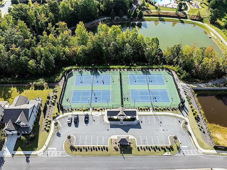 Tennis courts and pond aerial shot